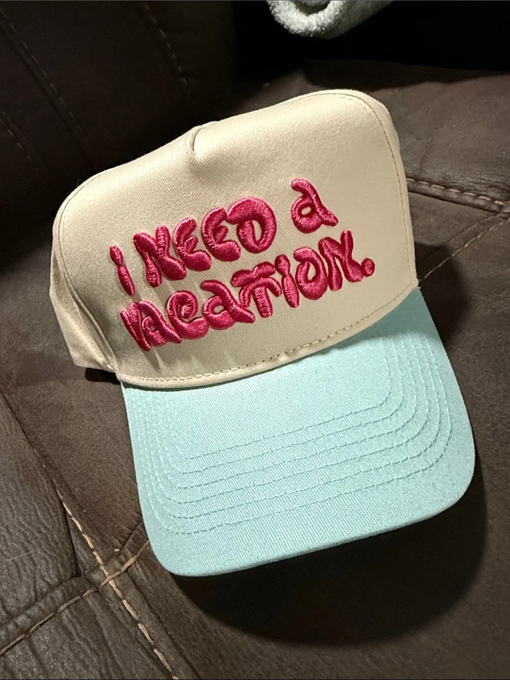 Women’s Beige & Light Blue Embroidered 'I Need a Vacation' Trucker Hat